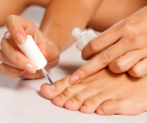 applying polish to toes