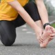 runner holding foot
